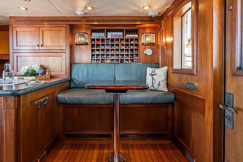 a living room with a couch aboard LADY BAHI Yacht for Sale