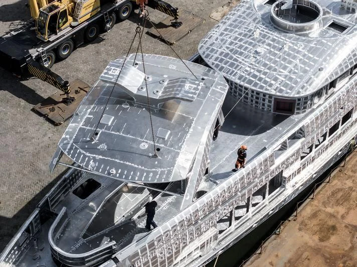 a large building with a dome roof aboard ORION Yacht for Sale