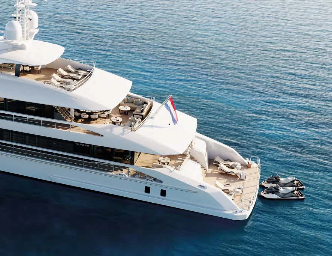 a large white yacht with a smaller boat on it aboard ORION Yacht for Sale