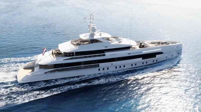 a white yacht on the water aboard ORION Yacht for Sale