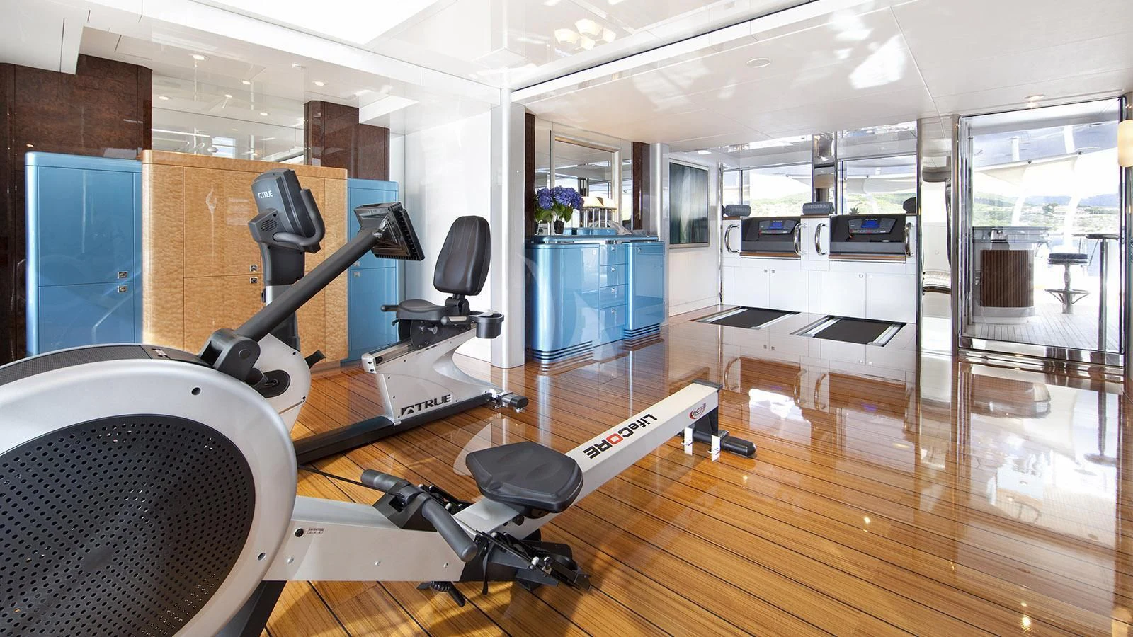 a room with a large mirror and a large projector screen aboard SYCARA V Yacht for Sale