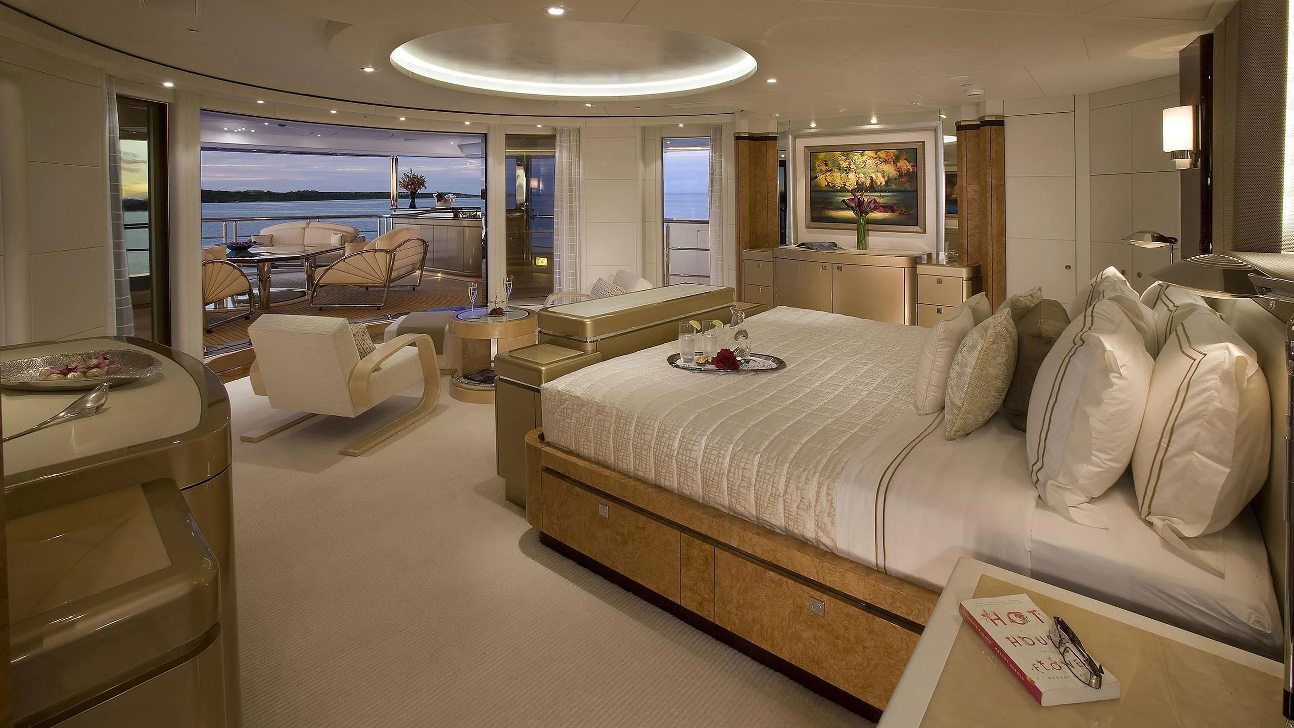 a large bed in a hotel room aboard SYCARA V Yacht for Sale