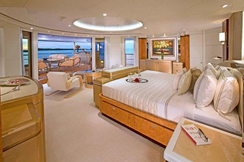 a bedroom with a large bed aboard SYCARA V Yacht for Sale