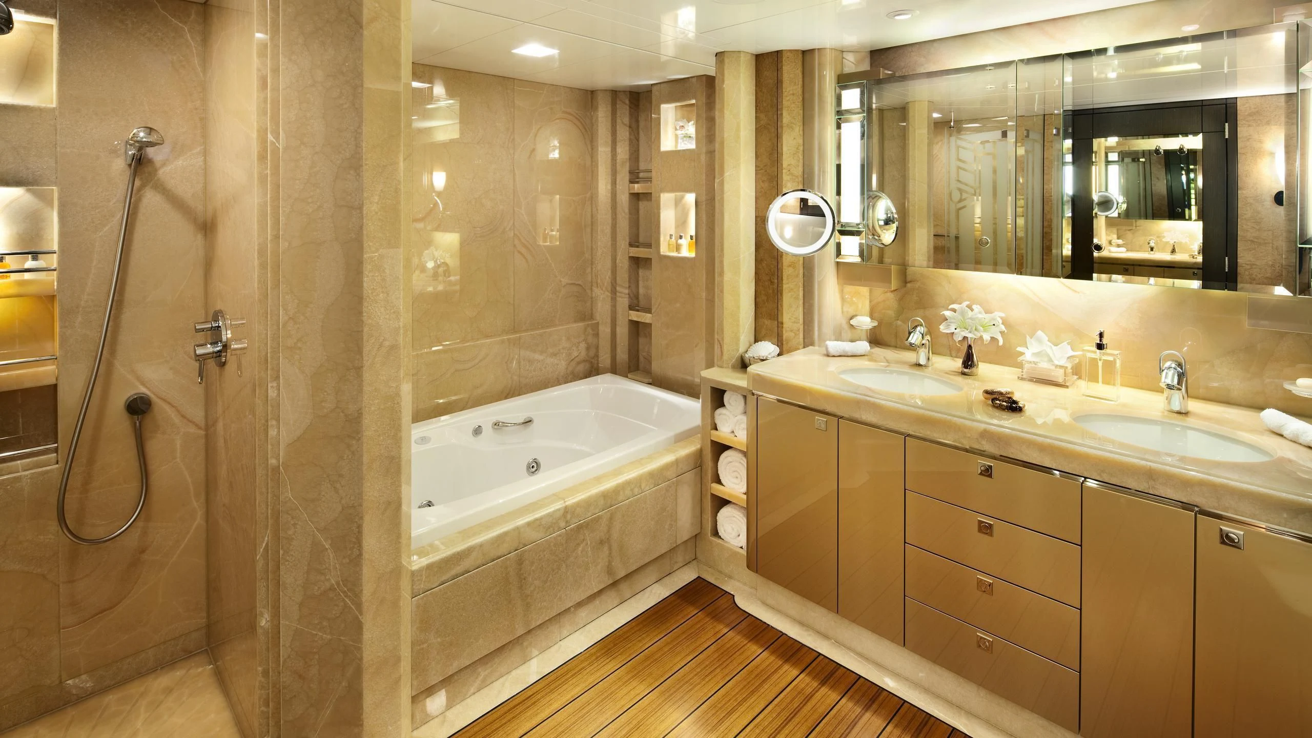 a bathroom with a tub sink and shower aboard SYCARA V Yacht for Sale
