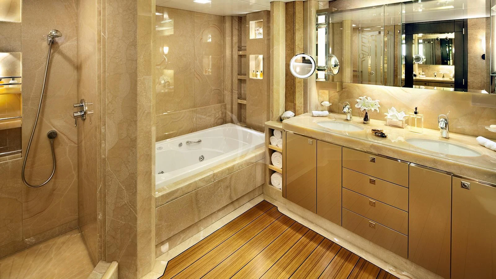 a bathroom with a tub sink and shower aboard SYCARA V Yacht for Sale