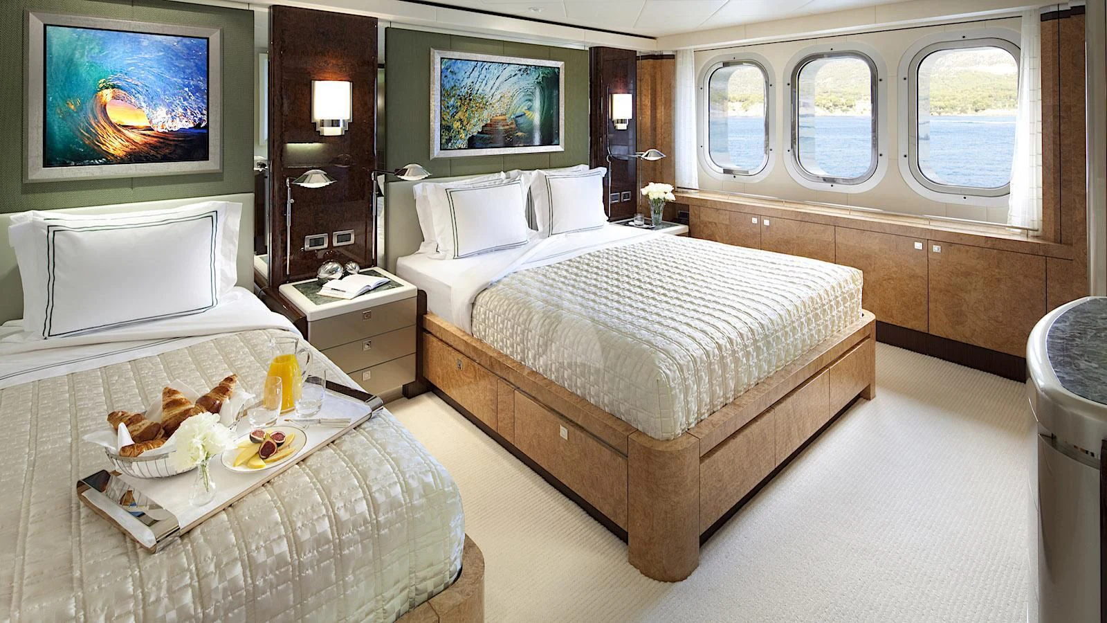 a room with two beds aboard SYCARA V Yacht for Sale