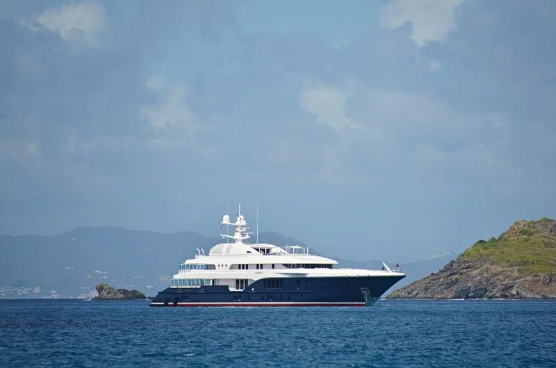 a large white boat in the water aboard SYCARA V Yacht for Sale
