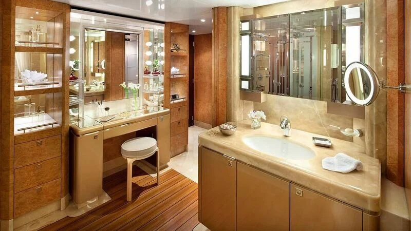 a bathroom with a sink and mirror aboard SYCARA V Yacht for Sale