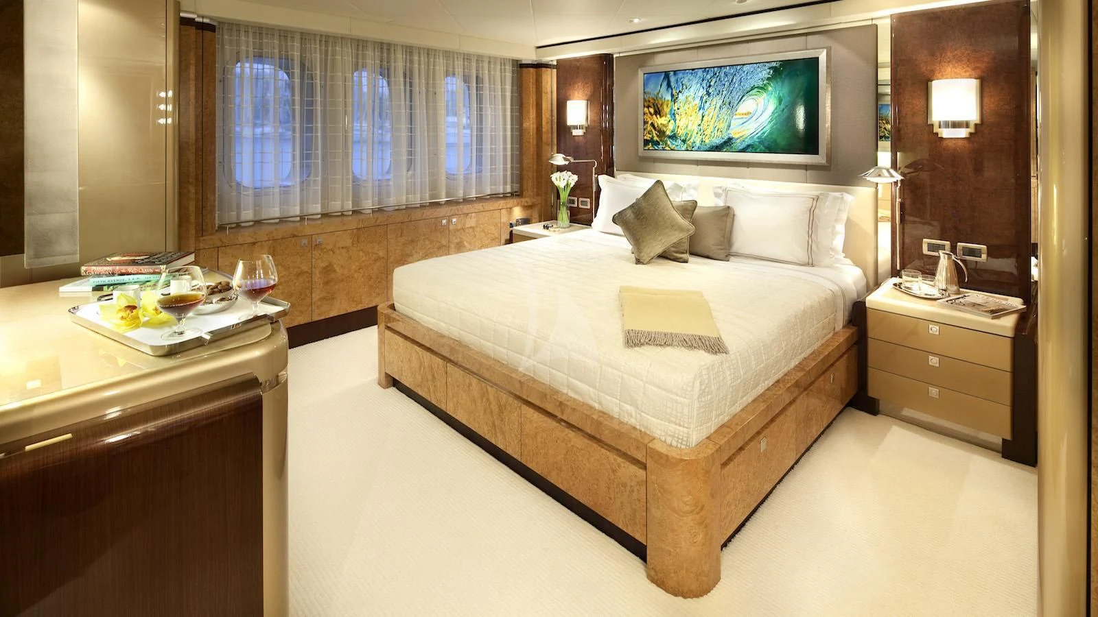 a hotel room with a large bed aboard SYCARA V Yacht for Sale