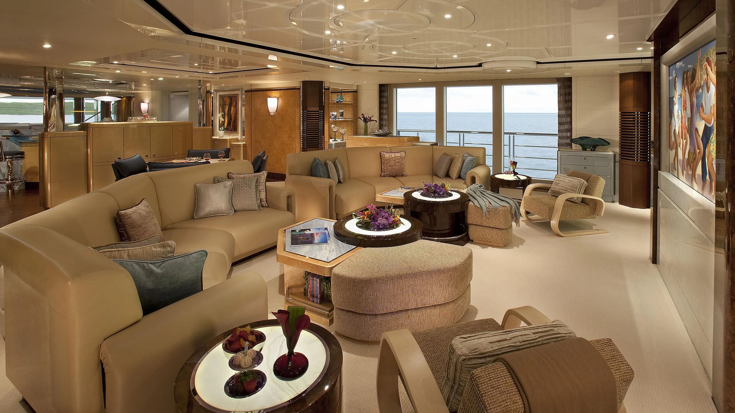 a living room with a large window aboard SYCARA V Yacht for Sale