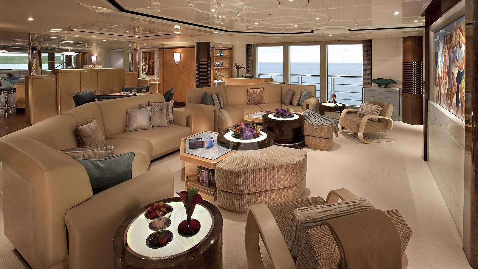 a living room with a large window aboard SYCARA V Yacht for Sale