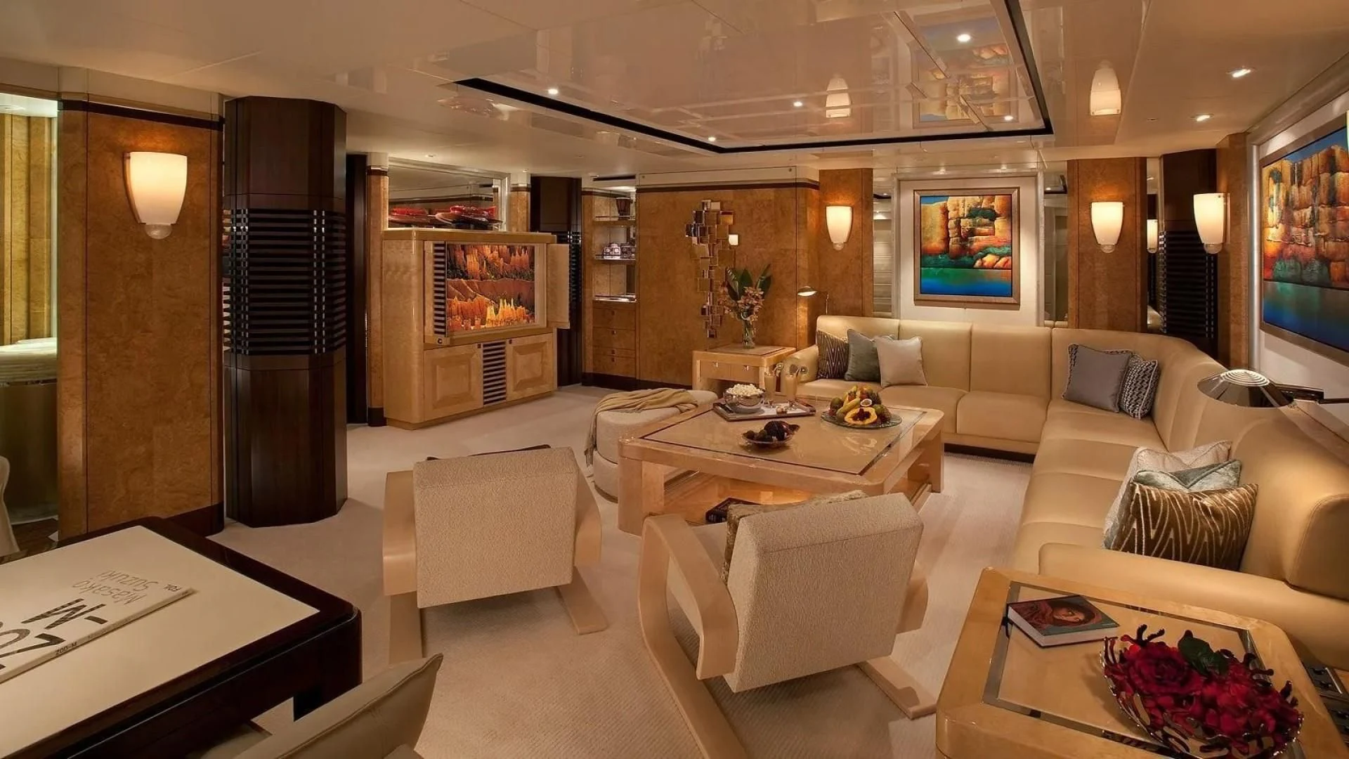 a living room with a large mirror aboard SYCARA V Yacht for Sale