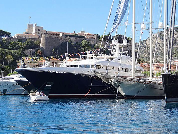 a group of boats are parked in a harbor aboard SYCARA V Yacht for Sale