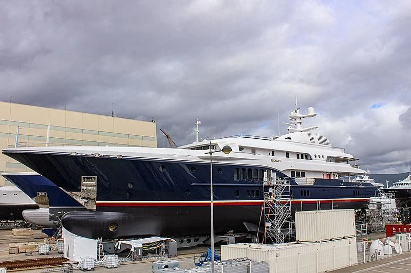 a large cruise ship docked aboard SYCARA V Yacht for Sale