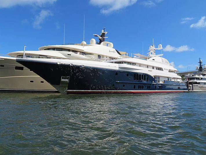 a large white boat in the water aboard SYCARA V Yacht for Sale