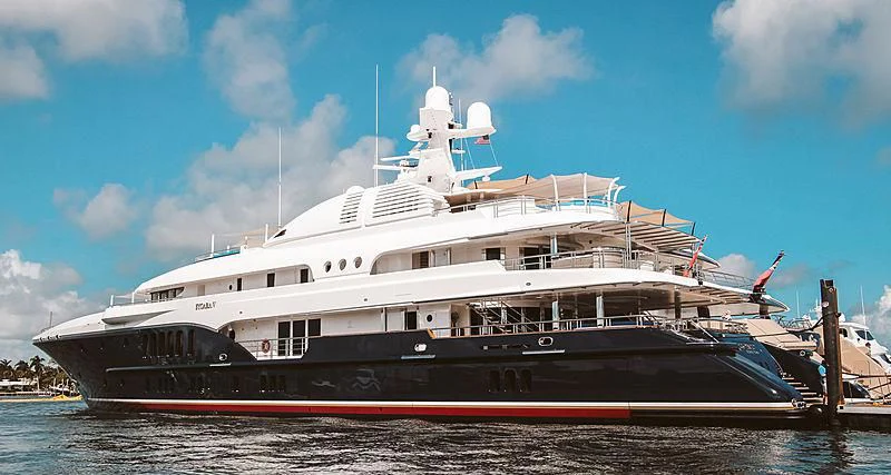 a large boat on the water aboard SYCARA V Yacht for Sale