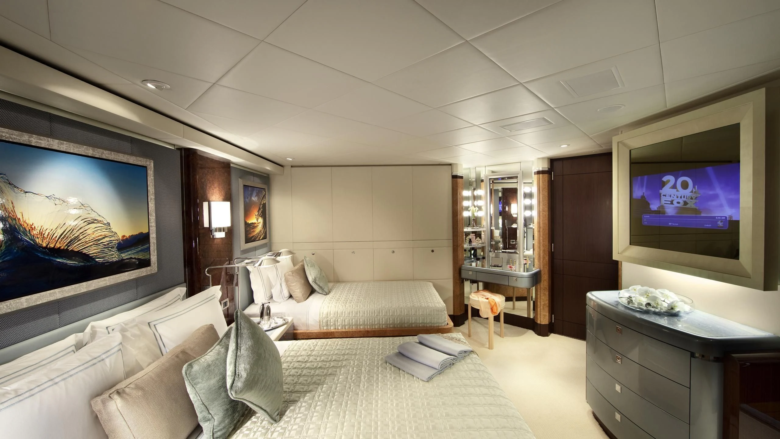 a room with a couch and a television aboard SYCARA V Yacht for Sale