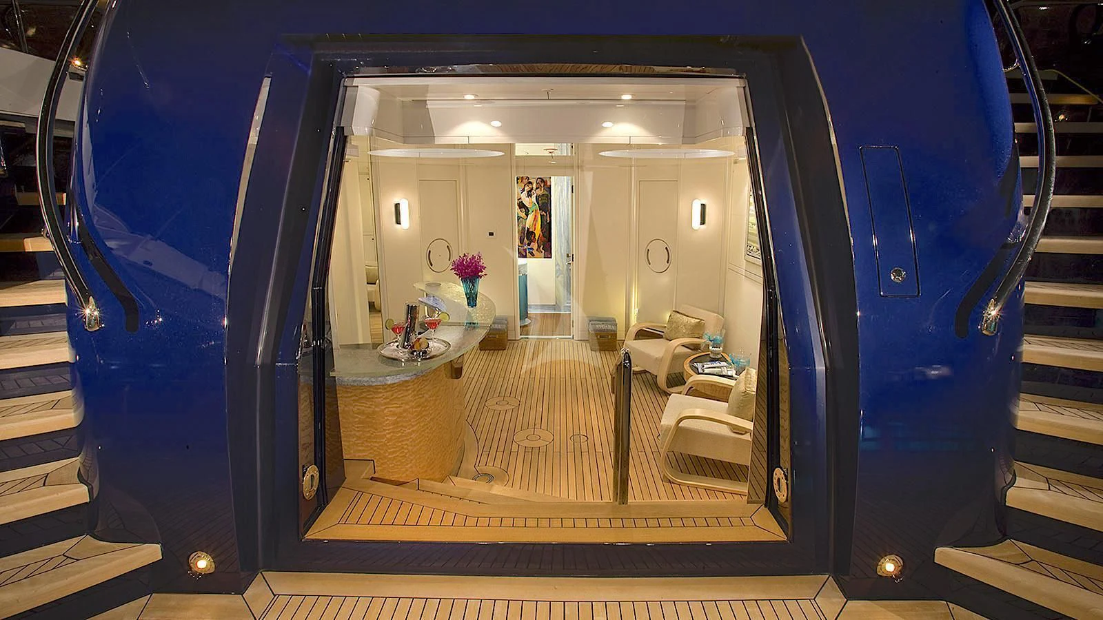 a view of a hallway through a glass door aboard SYCARA V Yacht for Sale