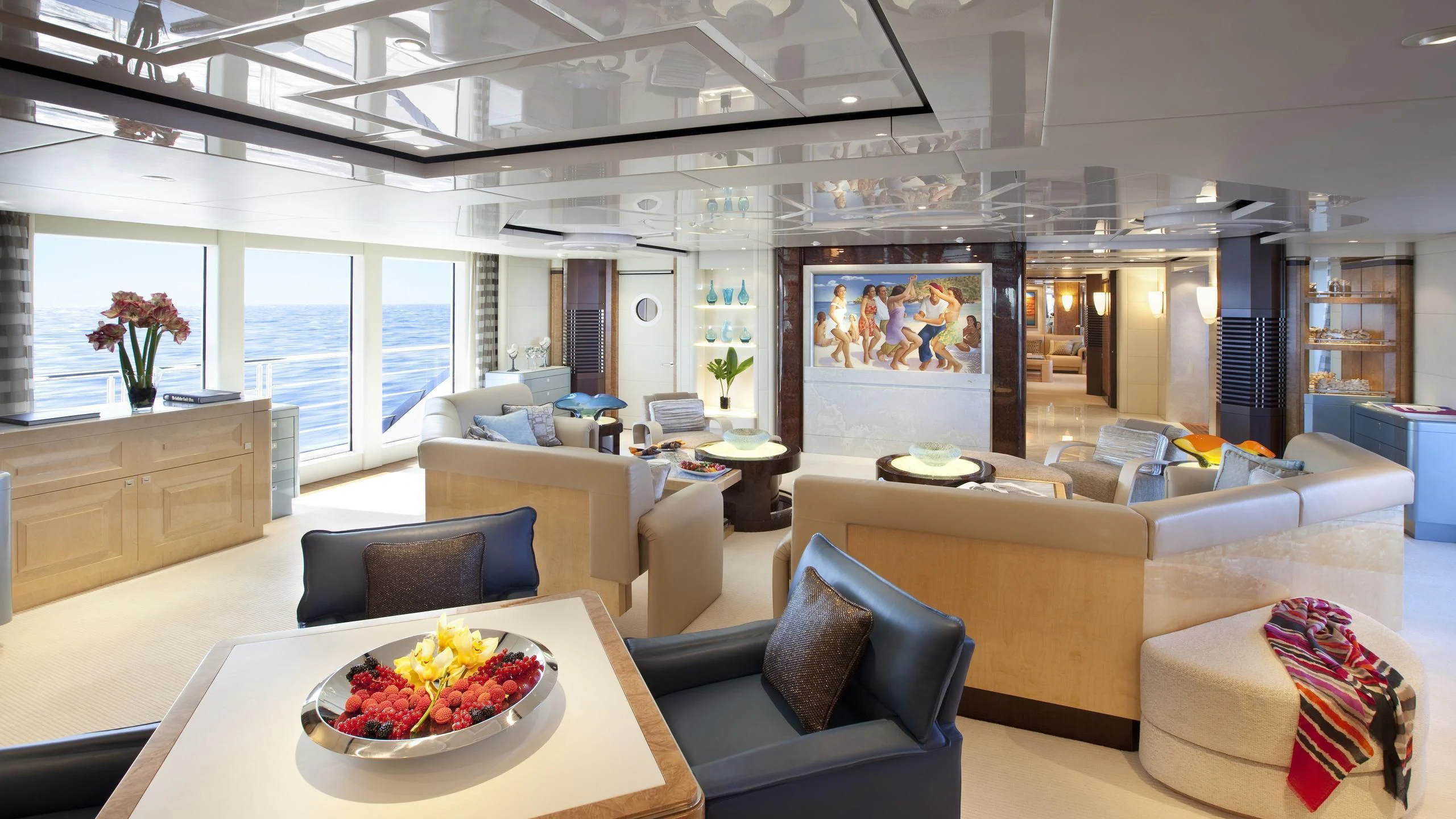 a living room with a large window aboard SYCARA V Yacht for Sale