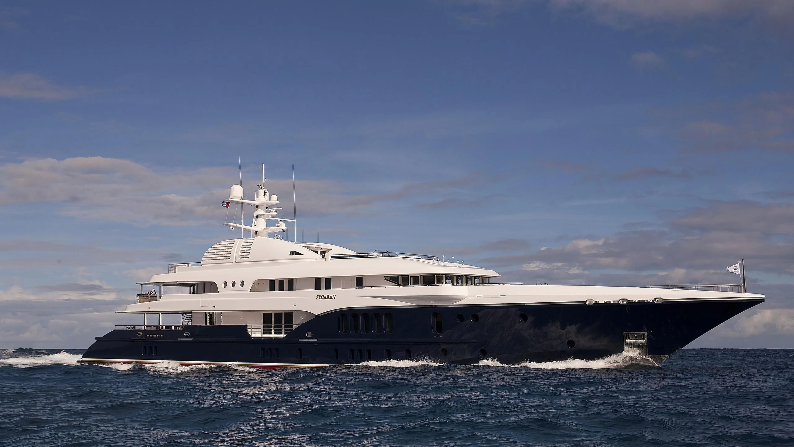 a large ship in the water aboard SYCARA V Yacht for Sale