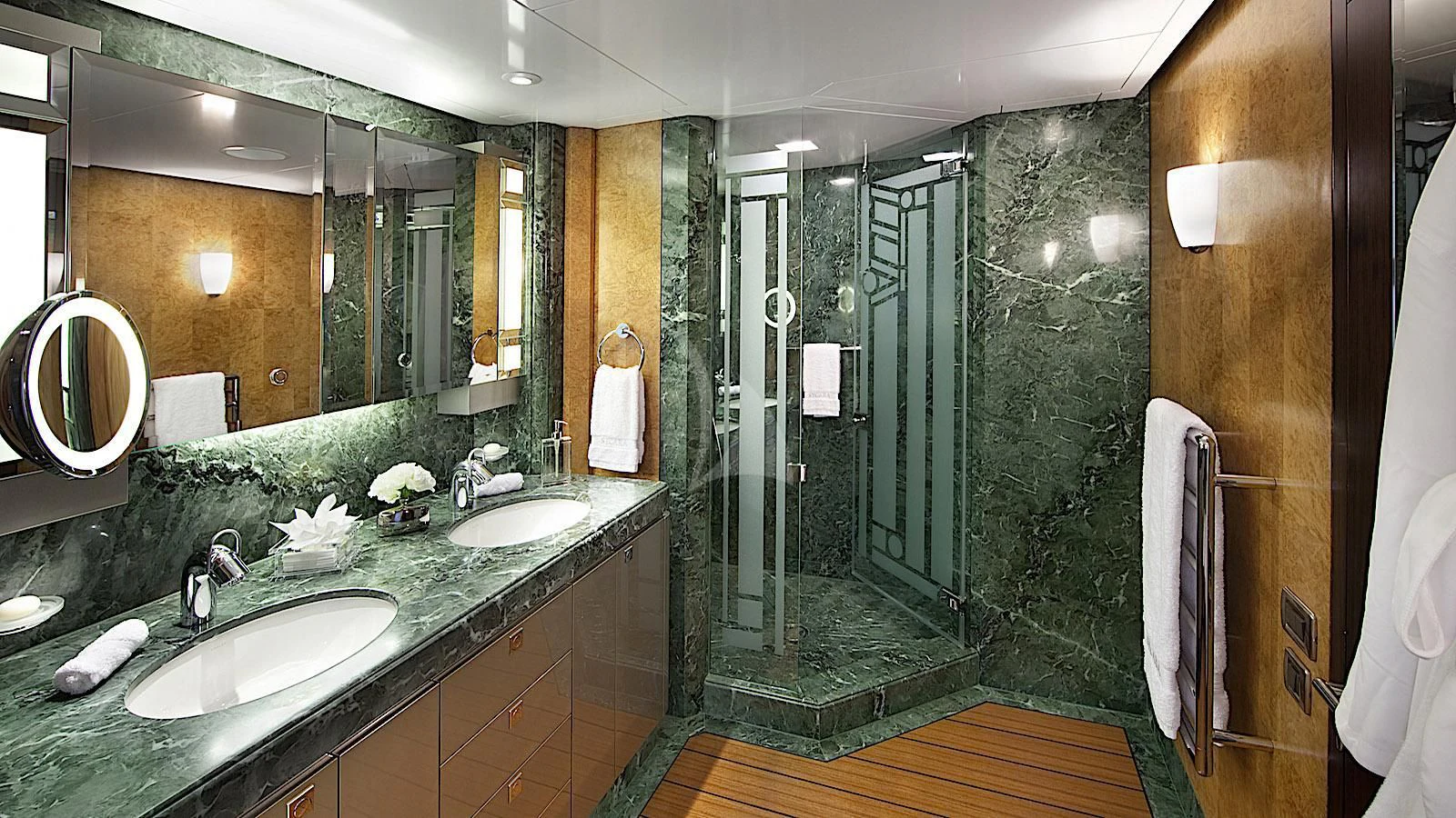 a bathroom with a large glass shower aboard SYCARA V Yacht for Sale