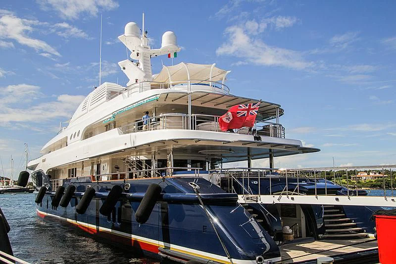 a large cruise ship docked aboard SYCARA V Yacht for Sale
