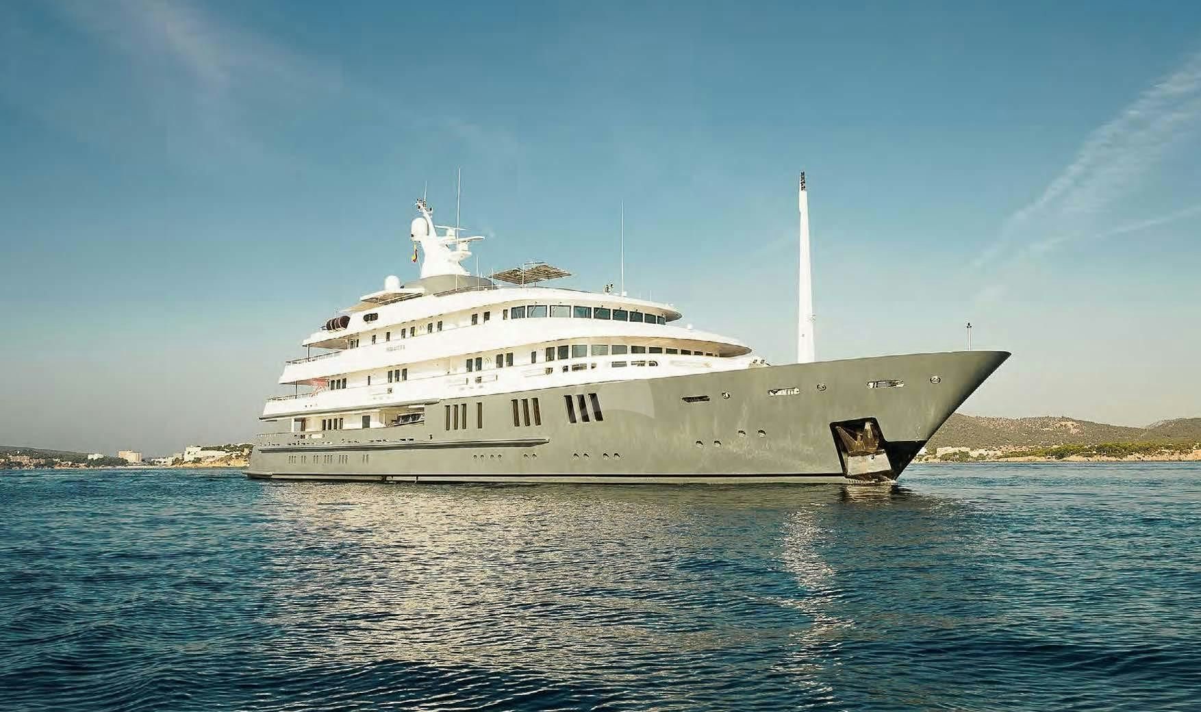 a large white ship in the water aboard BOADICEA Yacht for Sale