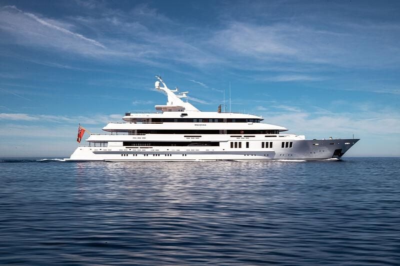 a large white ship in the water aboard BOADICEA Yacht for Sale