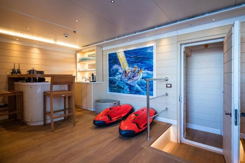 a room with a red bag and a red bag aboard BOADICEA Yacht for Sale