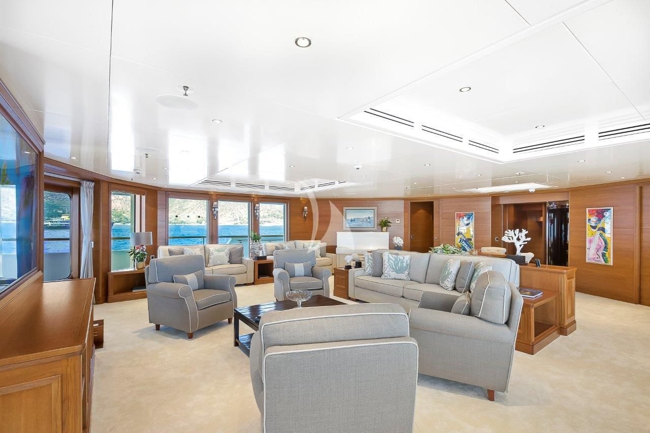 a large living room with a large open floor plan aboard BOADICEA Yacht for Sale