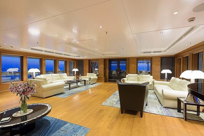 a living room with a large window aboard BOADICEA Yacht for Sale