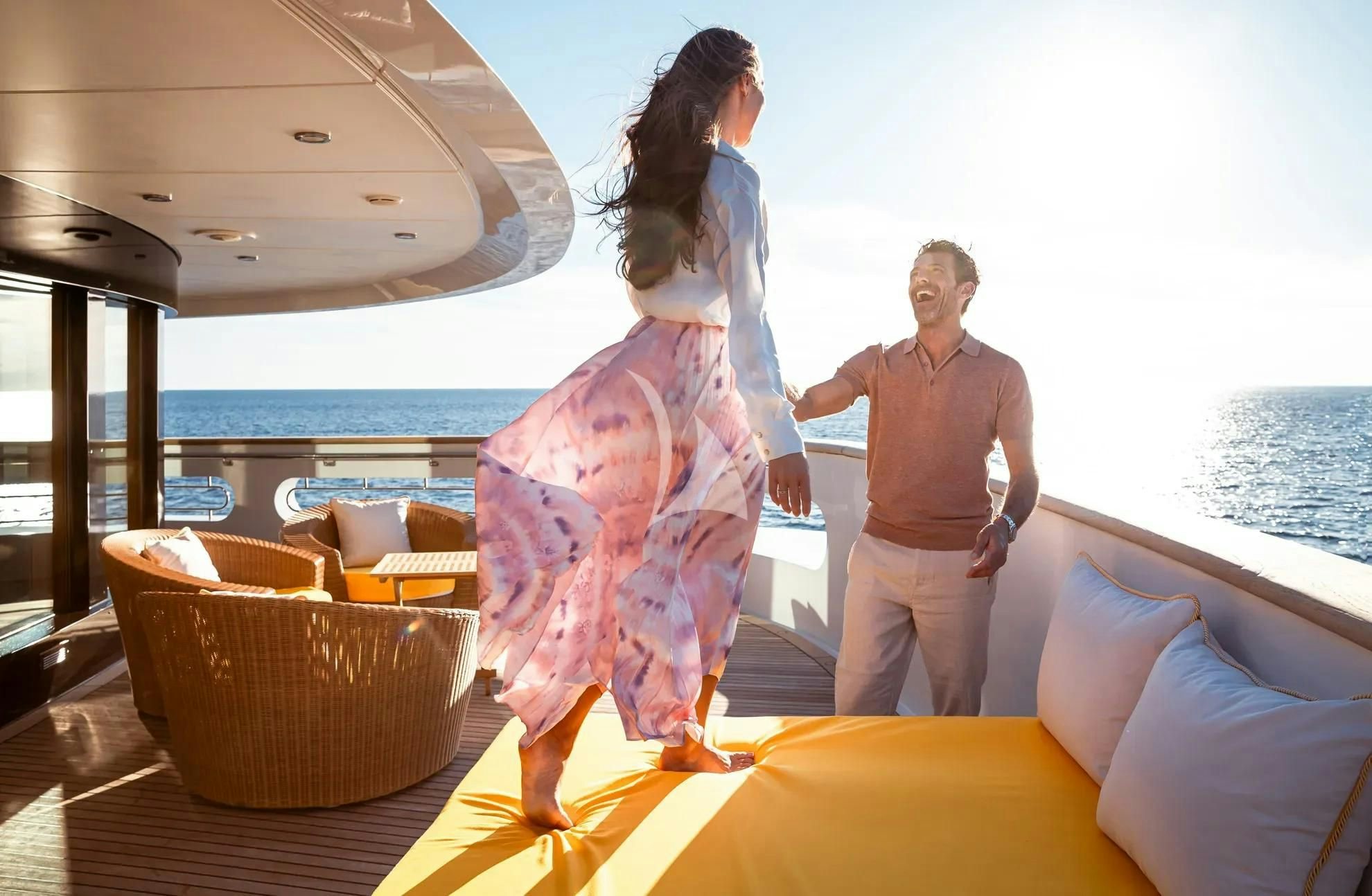 a group of people standing on a boat aboard BOADICEA Yacht for Sale