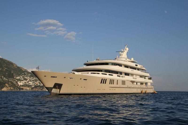 a large white ship in the water aboard BOADICEA Yacht for Sale
