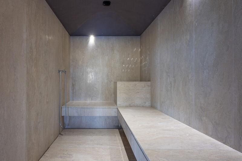 a room with a table and a bench aboard BOADICEA Yacht for Sale