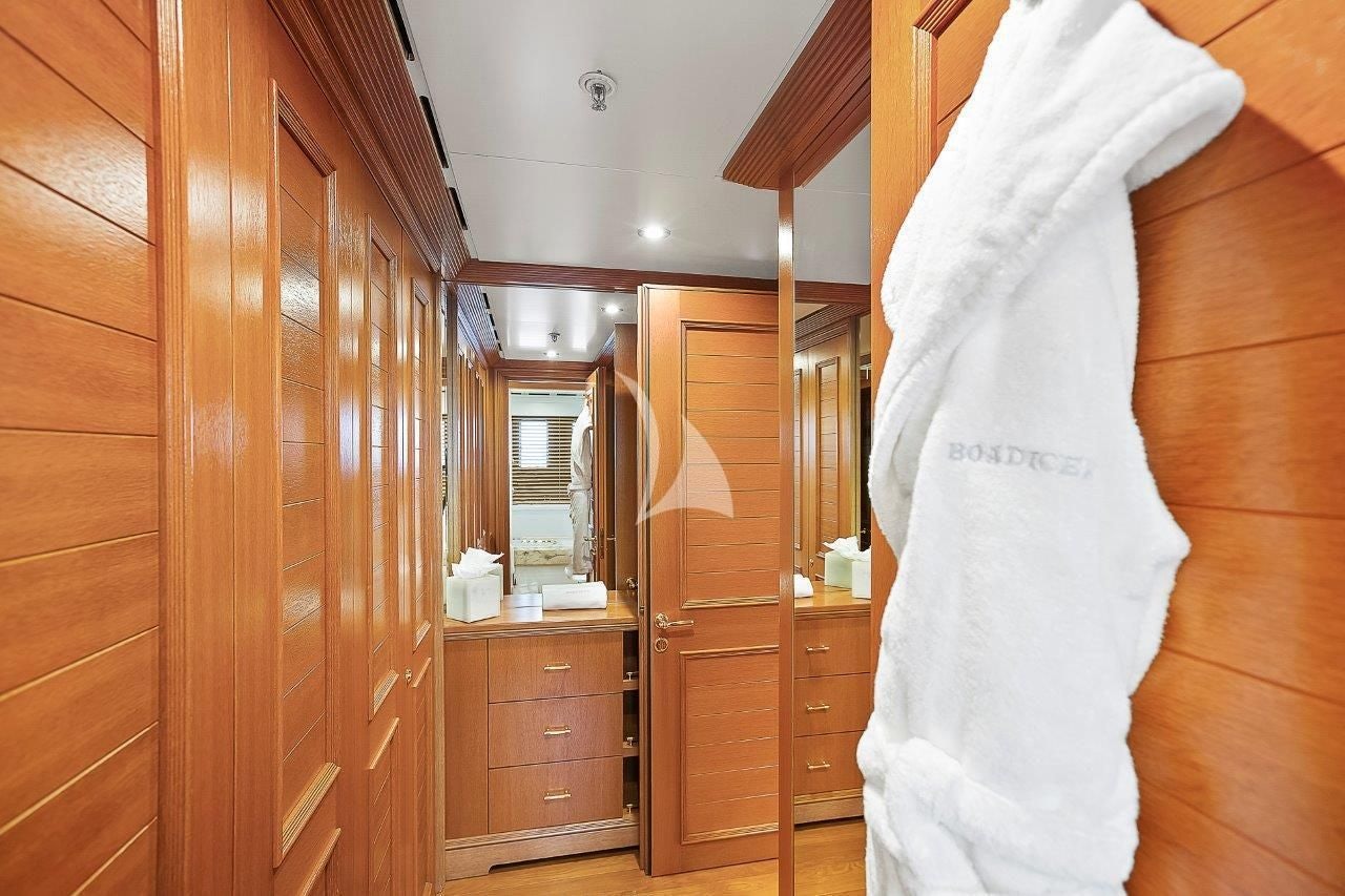 a white towel from a white towel on a wooden swinger aboard BOADICEA Yacht for Sale