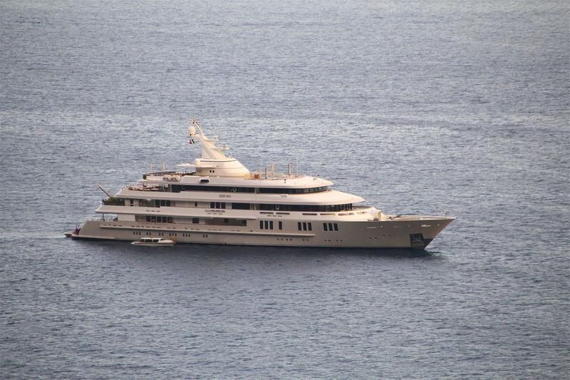 a large white boat in the water aboard BOADICEA Yacht for Sale