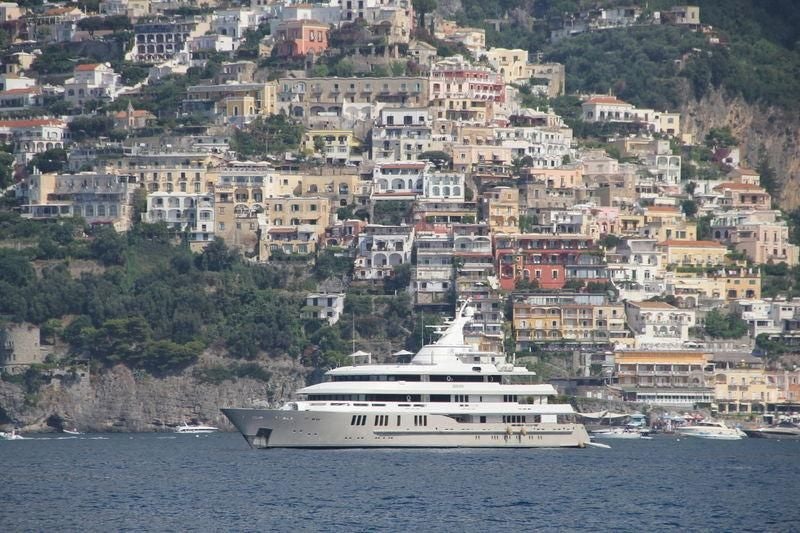 a large boat in the water aboard BOADICEA Yacht for Sale