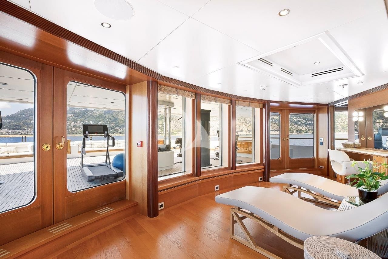 a room with a large window and a bed aboard BOADICEA Yacht for Sale