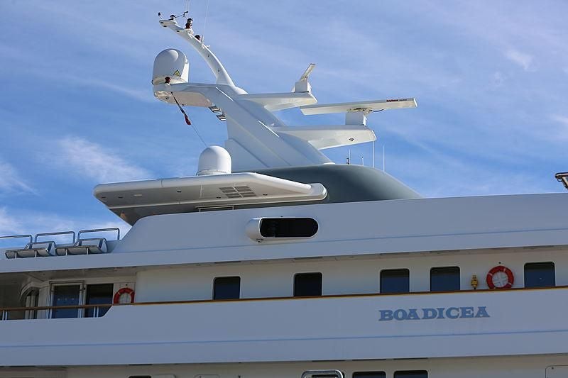 a plane flying over a building aboard BOADICEA Yacht for Sale