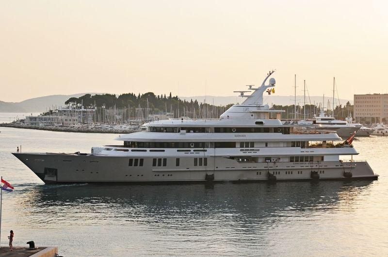 a large ship in the water aboard BOADICEA Yacht for Sale