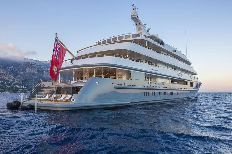 a large white boat on the water aboard BOADICEA Yacht for Sale