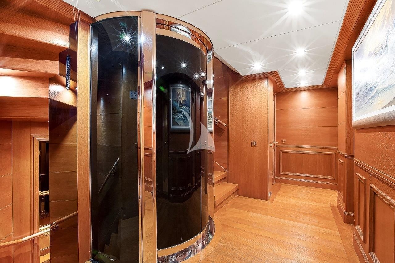 a room with a large mirror aboard BOADICEA Yacht for Sale