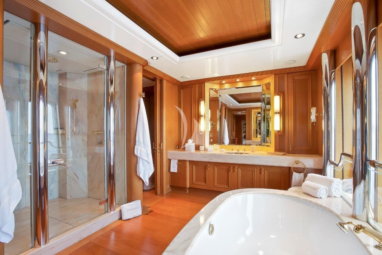 a bathroom with a large bathtub aboard BOADICEA Yacht for Sale
