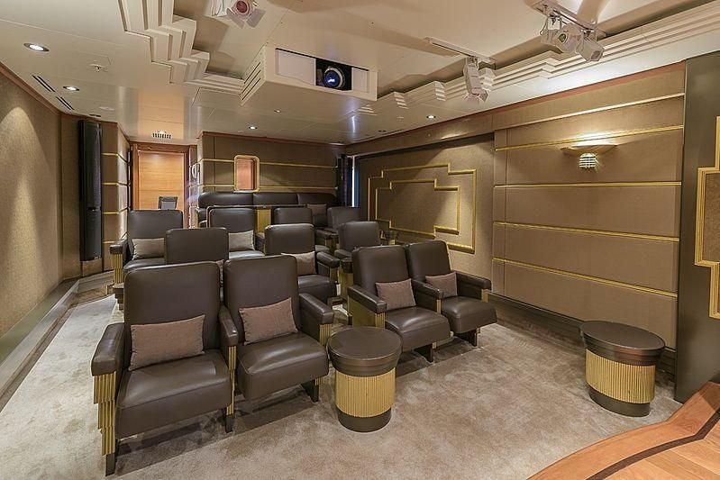 a room with chairs and a barrel aboard BOADICEA Yacht for Sale