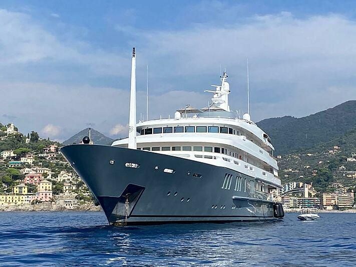 a large white boat in the water aboard BOADICEA Yacht for Sale