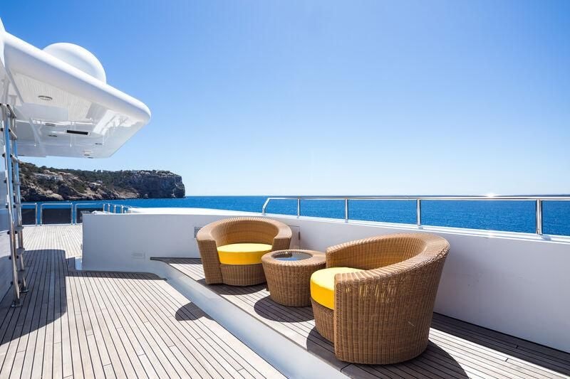 a couple of buckets on a deck overlooking a body of water aboard BOADICEA Yacht for Sale