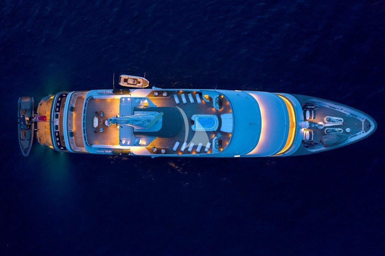 a blue bottle with a yellow label aboard BOADICEA Yacht for Sale