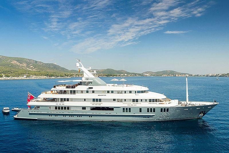 a large white yacht in the water aboard BOADICEA Yacht for Sale
