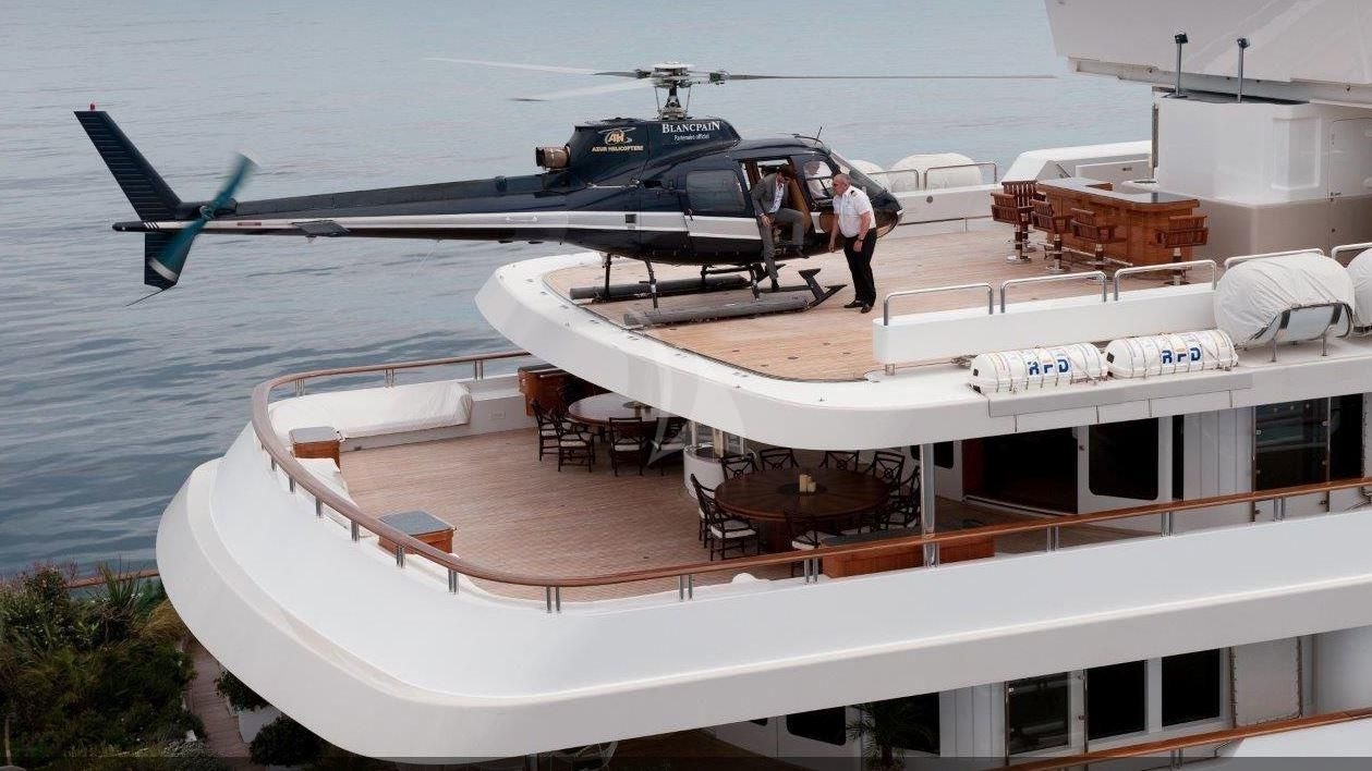 a helicopter flying over a boat aboard BOADICEA Yacht for Sale