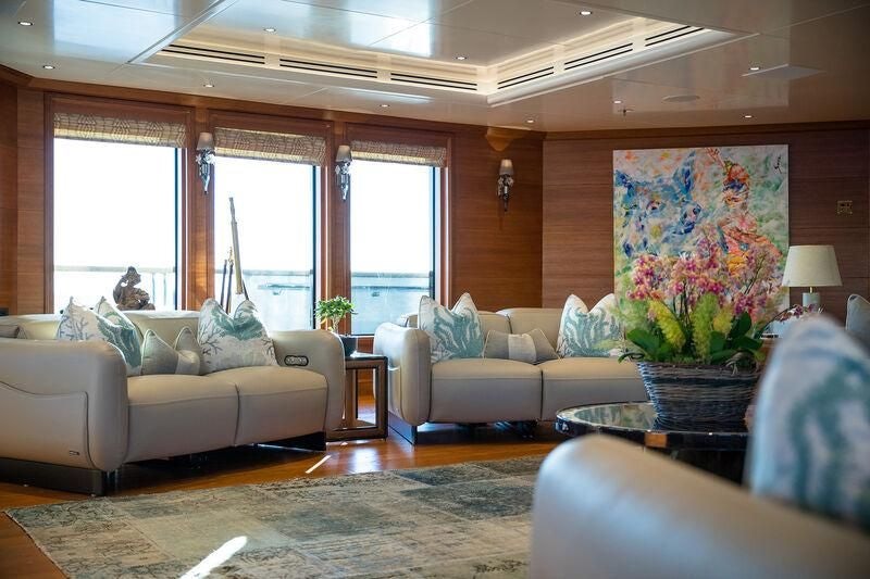 a living room with a large window aboard BOADICEA Yacht for Sale
